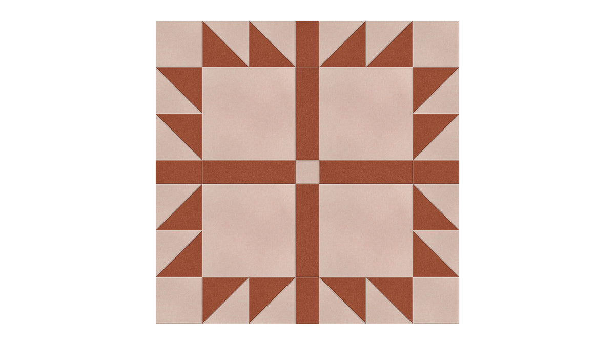 Felt Right Bears Paw quilt design in dark red and cream displayed in a bedroom or craft room