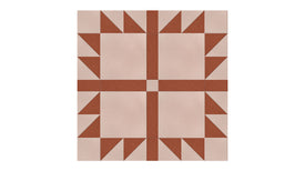 Felt Right Bears Paw quilt design in dark red and cream displayed in a bedroom or craft room