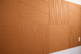 Cinnamon-colored wall panels with wavy linear relief pattern arranged in grid formation.