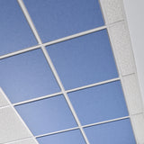 Blue Colorblock felt drop ceiling tiles in a white ACT ceiling grid