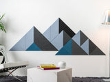 Mountain themed acoustic wall art in a modern living room setting
