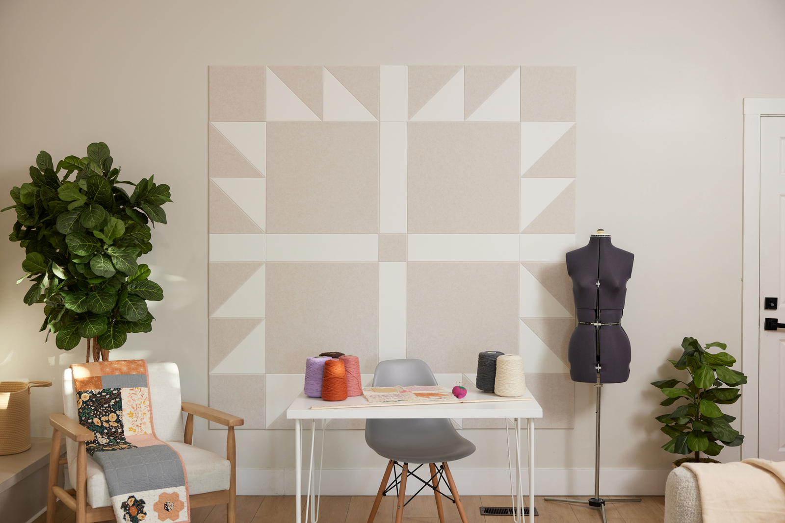 Felt Right Bears Paw quilt design wall in cream and white displayed in a bedroom or craft room