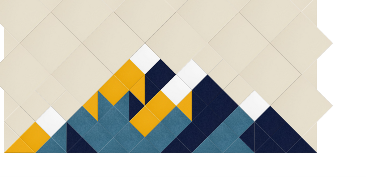 Geometric mountain design in navy, teal, gold, and white on beige quilted background.