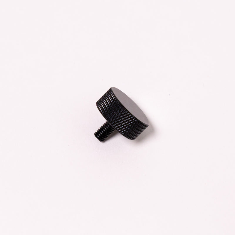 Black knurled thumb screw, angled view