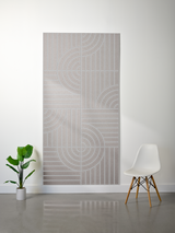 Thick gray felt sheet with engraved geometric pattern of vertical lines and curved shapes in layered sections.