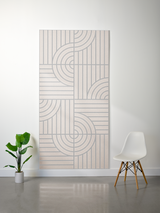 Thick cream-colored felt sheet with engraved geometric pattern of vertical lines and curved arc designs in four quadrants.