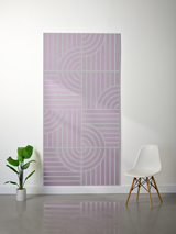 Lavender felt sheet with engraved geometric pattern of curved lines and vertical stripes in four quadrants.