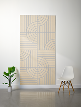Tan felt sheet with engraved geometric pattern of vertical lines and curved arc motifs arranged in quadrants.
