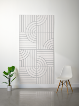 Cream felt sheet with engraved geometric pattern of vertical lines and curved arc sections arranged in repeating blocks.
