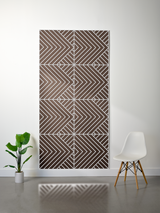 Brown and cream layered felt sheet with geometric chevron and diagonal line engraved pattern.