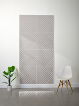 Gray felt sheet with engraved geometric chevron and diagonal stripe pattern divided into rectangular sections.