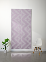 Lavender felt sheet with engraved geometric chevron pattern in four sections, displayed on white wall.