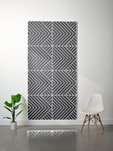Charcoal gray felt sheet with white engraved chevron and diagonal stripe pattern in four quadrants.