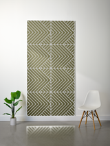 Sage green felt sheet with engraved geometric chevron and diagonal stripe pattern in layered sections.