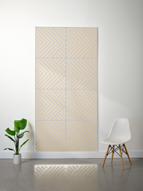Cream and tan felt sheet with engraved geometric chevron pattern arranged in four quadrants.