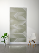 Sage green felt sheet with engraved geometric chevron and diagonal stripe pattern in four quadrants.