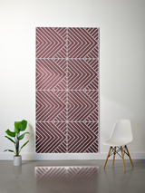 Burgundy felt sheet with layered engraved geometric chevron and diagonal stripe pattern arranged in four quadrants.