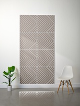 Beige felt sheet with engraved geometric chevron and diagonal stripe pattern in four quadrants.