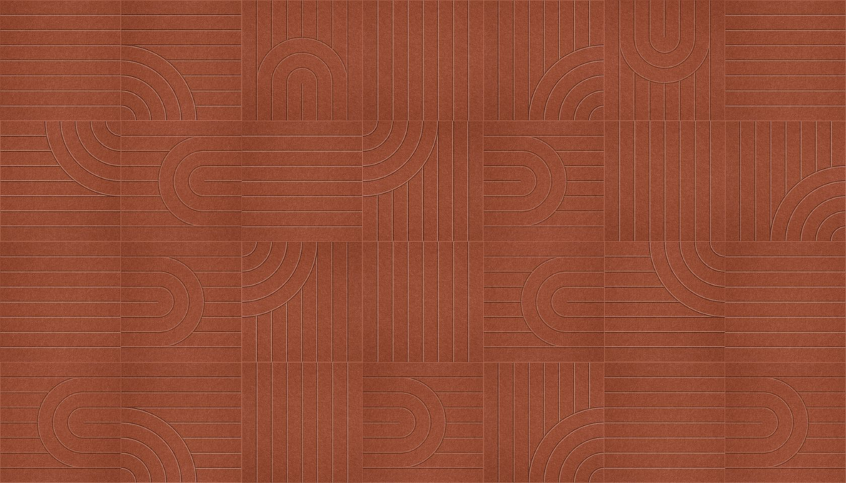 Terracotta tile surface with geometric line patterns featuring curved and linear designs.