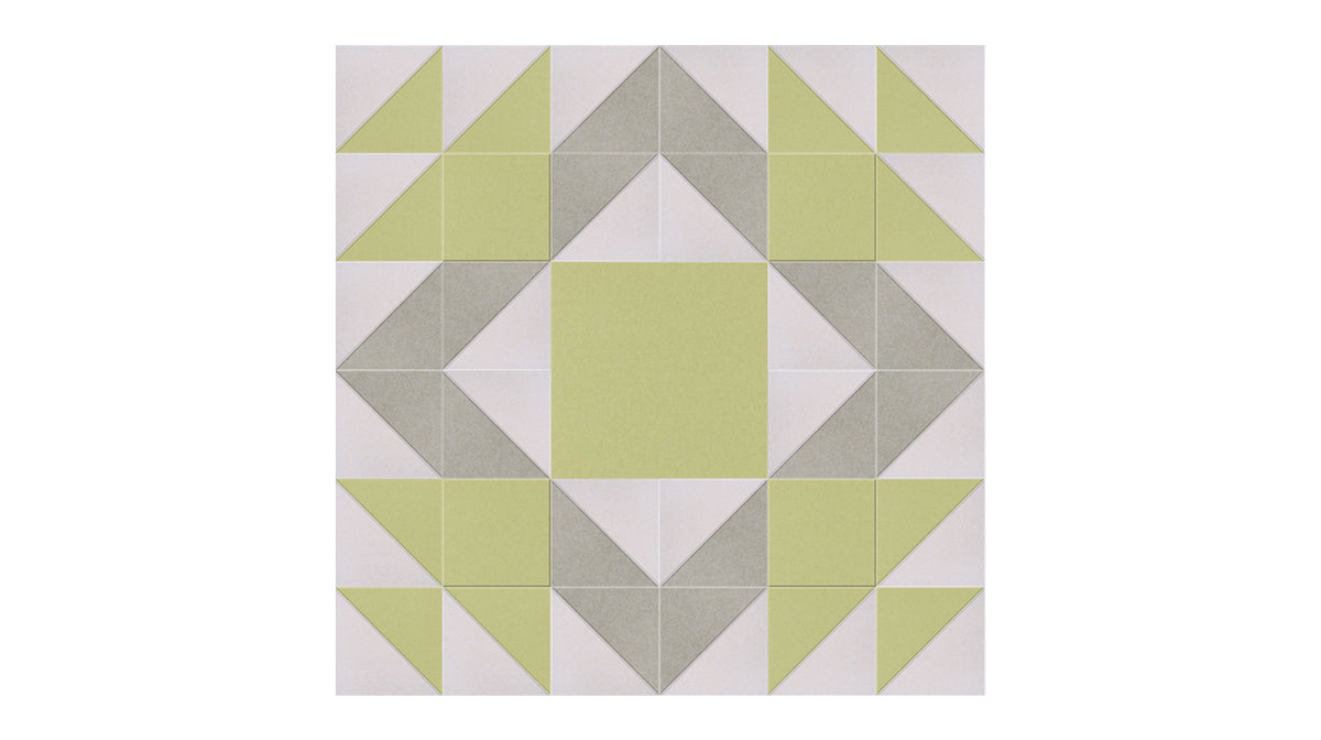 Felt Right Mother's Favorite in Aloe quilt design wall in light greens and cream displayed in a bedroom or craft room