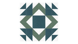 Felt Right Mothers Favorite quilt design wall in shades of green and white displayed in a bedroom and craft room