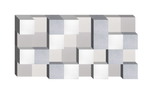3D modular wall design with interlocking white, gray, and blue-gray geometric blocks arranged in a checkerboard pattern.