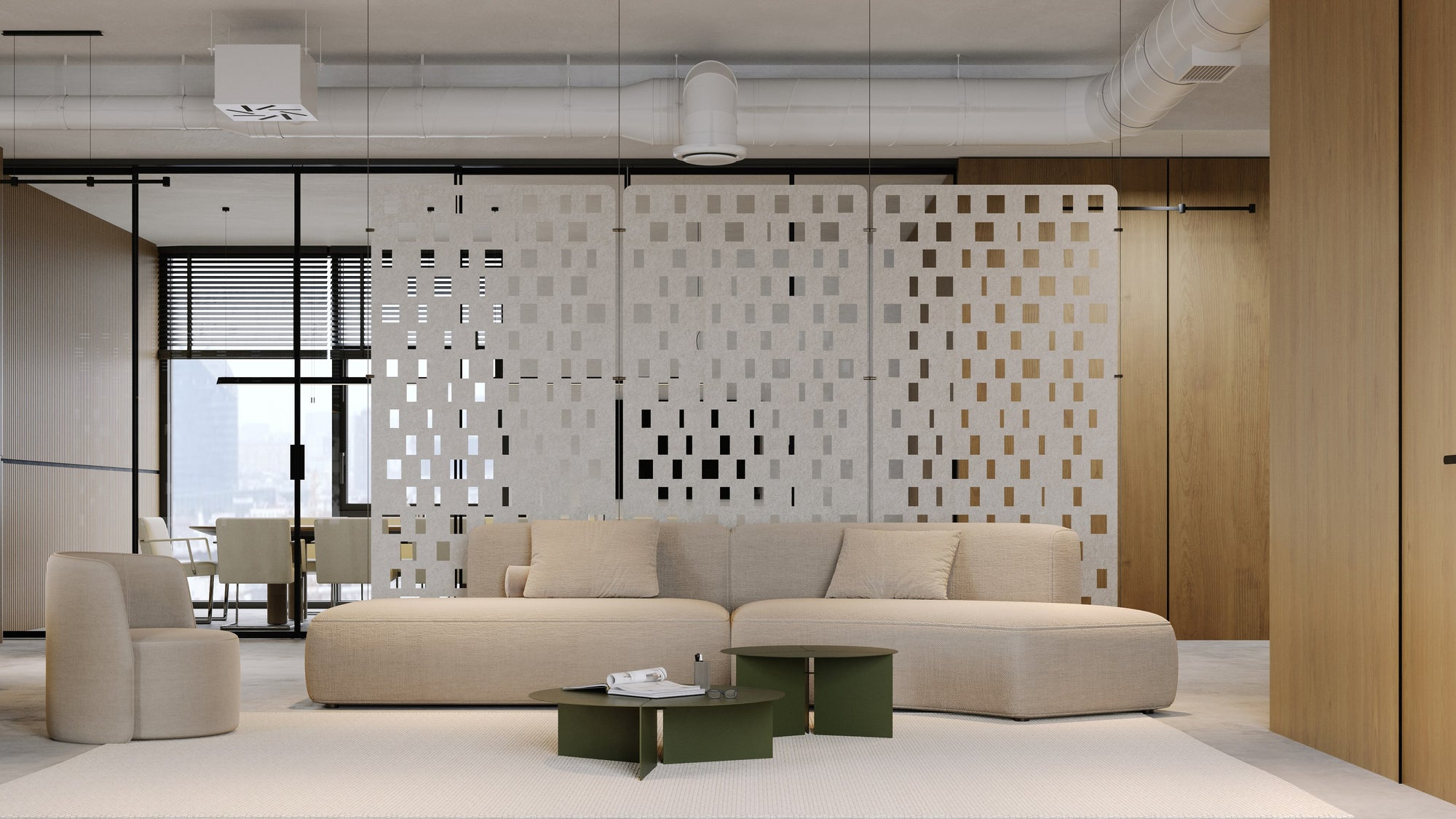 Gray geometric room dividers in a open office space
