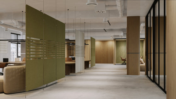 green acoustic room dividers hanging from a ceiling
