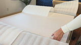 Video showing installation of acoustic suspended flat cloud baffles