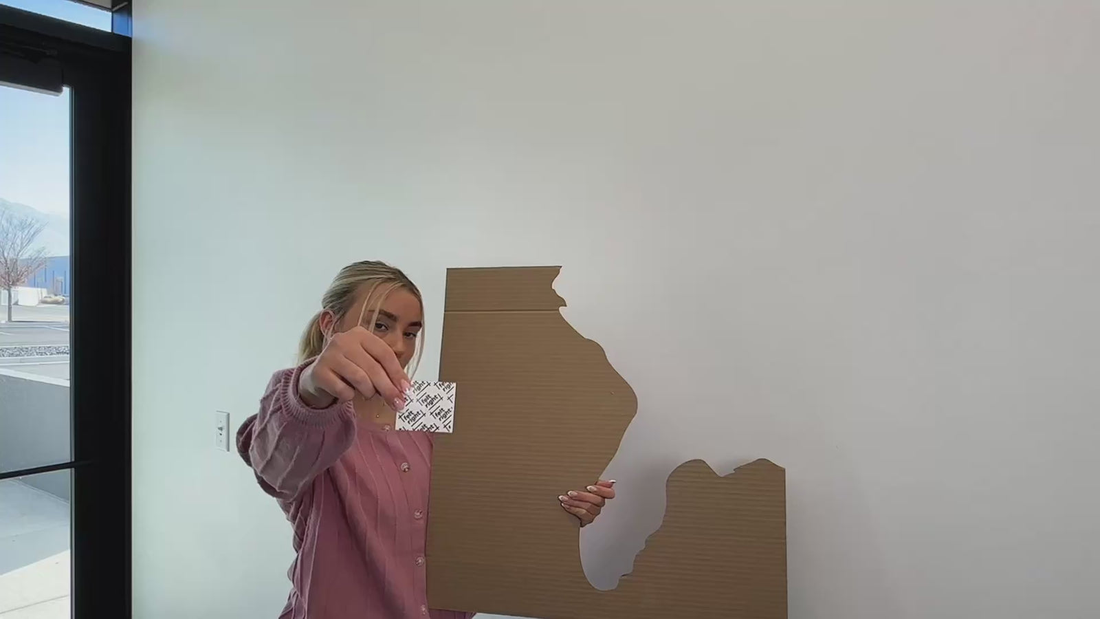 Video showing installation of world map wall art