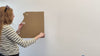Video showing installation of world map wall art