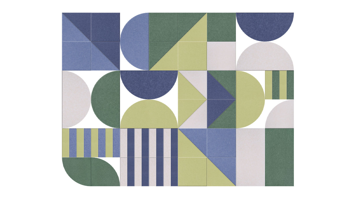 A Felt Right design on a wall using circles, triangles, and stripes in shades of green and blue creating a geometric pattern.