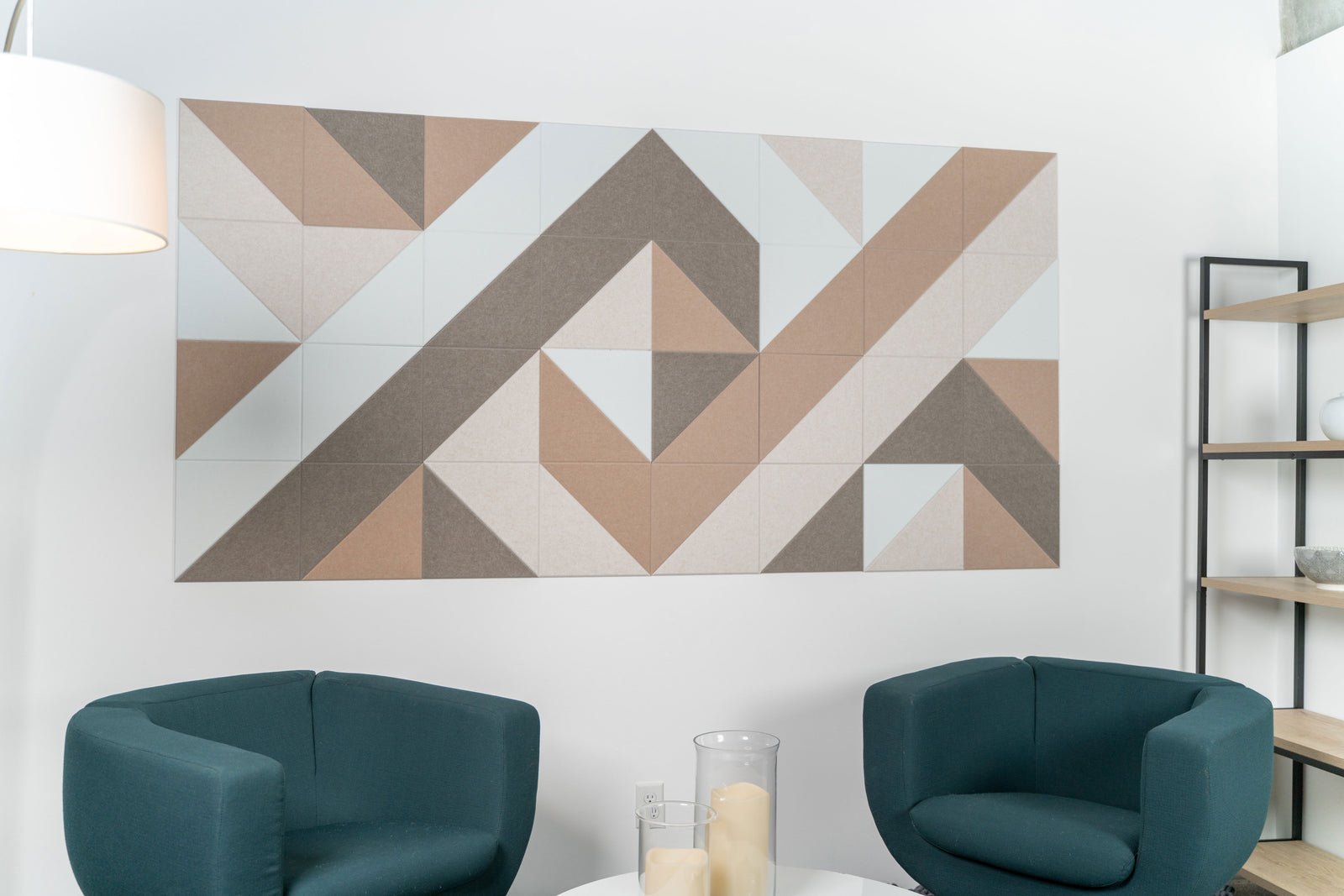 A Felt Right wall-mounted geometric patterned tile in beige, white, and brown colors, providing a modern aesthetic to a room.