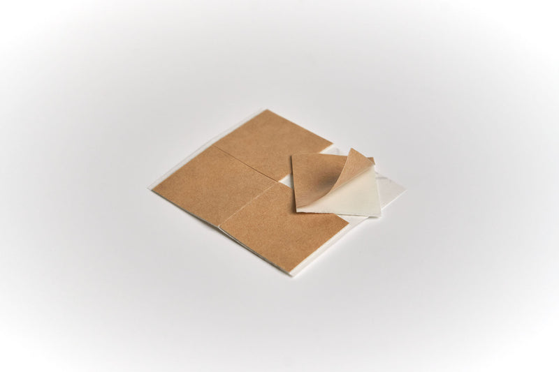removable adhesive pack 